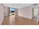 Spacious living room with hardwood floors and plenty of natural light at 3930 University Center Dr # 202, Las Vegas, NV 89119