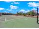 Enjoy a fun tennis match on this well-maintained outdoor court with beautiful landscaping and clear blue skies overhead at 3930 University Center Dr # 202, Las Vegas, NV 89119