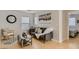 Bright living room features neutral decor, wood floors, a comfortable couch, and an open layout at 4135 Pistachio Nut Ave, Las Vegas, NV 89115
