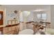 Open-concept living space featuring hardwood floors, elegant decor, and a staircase leading to the upper level at 4135 Pistachio Nut Ave, Las Vegas, NV 89115