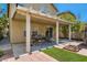 Relaxing covered patio with a dining set, offering a great space for outdoor entertaining at 4135 Pistachio Nut Ave, Las Vegas, NV 89115