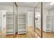 Bright closet with custom built-in shelving and mirrored doors, providing ample storage space at 4237 Brockton Green Ct, Las Vegas, NV 89110
