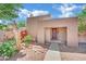 Inviting single-story home with stucco exterior, desert landscaping, and an inviting entryway at 4237 Brockton Green Ct, Las Vegas, NV 89110