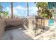 Backyard featuring large patio with gazebo, lush landscaping and privacy wall at 5025 Starfinder Ave, Las Vegas, NV 89108