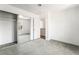Simple bedroom with mirrored closet doors, white walls, and neutral carpet, creating a calming atmosphere at 5025 Starfinder Ave, Las Vegas, NV 89108