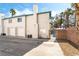 Exterior features a two-car garage, brick fence and a gated entrance at 5025 Starfinder Ave, Las Vegas, NV 89108