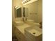 Modern bathroom featuring dual sinks, sleek faucets, and ample counter space for storage at 5241 Caspian Springs Dr # 103, Las Vegas, NV 89120