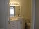 Bright bathroom with a modern vanity, contemporary sink, and neutral color scheme at 5241 Caspian Springs Dr # 103, Las Vegas, NV 89120