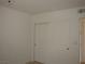 A bedroom with a large closet with sliding doors for ample storage space at 5241 Caspian Springs Dr # 103, Las Vegas, NV 89120