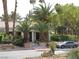 Front view of the community clubhouse entrance with landscaping and palm trees at 5241 Caspian Springs Dr # 103, Las Vegas, NV 89120