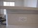 Modern countertop detail showing a built-in outlet with USB ports, great for a kitchen island at 5241 Caspian Springs Dr # 103, Las Vegas, NV 89120