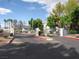Gated community entrance featuring well-maintained landscaping and secure access at 5241 Caspian Springs Dr # 103, Las Vegas, NV 89120