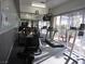Community gym featuring modern cardio equipment and ample natural light at 5241 Caspian Springs Dr # 103, Las Vegas, NV 89120