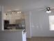 Modern kitchen with stainless steel appliances, white cabinets, and ample counter space at 5241 Caspian Springs Dr # 103, Las Vegas, NV 89120