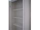 Bright pantry with white shelving for optimal storage solutions at 5241 Caspian Springs Dr # 103, Las Vegas, NV 89120