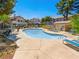 Community pool with lounge chairs provides a relaxing outdoor space for residents at 5241 Caspian Springs Dr # 103, Las Vegas, NV 89120