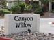 Canyon Willow community sign with landscaping and stone base at 5241 Caspian Springs Dr # 103, Las Vegas, NV 89120