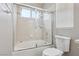 Bright bathroom with shower-over-tub and tiled enclosure at 5286 Monterey Park Cir, Las Vegas, NV 89146