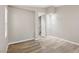 Open bedroom has adjacent staircase and modern lighting at 5286 Monterey Park Cir, Las Vegas, NV 89146