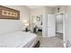 A carpeted bedroom with a mirrored closet, providing ample storage space at 5286 Monterey Park Cir, Las Vegas, NV 89146
