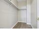 Walk-in closet with carpet flooring and rod for hanging clothing at 5286 Monterey Park Cir, Las Vegas, NV 89146