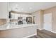 Bright kitchen features white cabinets and stainless steel appliances at 5286 Monterey Park Cir, Las Vegas, NV 89146