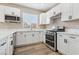 Modern kitchen with sleek appliances and ample counter space at 5286 Monterey Park Cir, Las Vegas, NV 89146