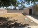Backyard with rocks and building at 5424 Del Rey Ave, Las Vegas, NV 89146