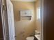Bathroom with toilet, sink and medicine cabinet at 5424 Del Rey Ave, Las Vegas, NV 89146