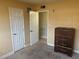 A bedroom showing the closet, doorways and an antique dresser at 5424 Del Rey Ave, Las Vegas, NV 89146