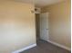 A bedroom with light colored walls and carpet at 5424 Del Rey Ave, Las Vegas, NV 89146