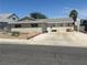 Charming single-story home with a spacious driveway and a low-maintenance front yard at 5424 Del Rey Ave, Las Vegas, NV 89146