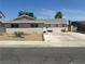 Charming single-story home with a spacious driveway and a low-maintenance front yard at 5424 Del Rey Ave, Las Vegas, NV 89146