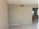 Inviting living room with tiled floors and a neutral palette at 5424 Del Rey Ave, Las Vegas, NV 89146