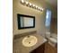 Bright bathroom with a granite countertop, and a convenient shower and toilet at 5445 Indian Cedar Dr, Las Vegas, NV 89135