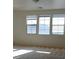Bedroom with natural light from three windows and neutral carpeting at 5445 Indian Cedar Dr, Las Vegas, NV 89135