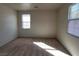 Bedroom featuring natural light and plush carpeting at 5445 Indian Cedar Dr, Las Vegas, NV 89135