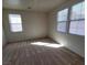 This bedroom has lots of natural light and plush carpeting at 5445 Indian Cedar Dr, Las Vegas, NV 89135