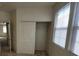 Bedroom featuring a closet, natural light, and neutral carpet at 5445 Indian Cedar Dr, Las Vegas, NV 89135