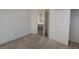 Bedroom features neutral paint and soft carpeting at 5445 Indian Cedar Dr, Las Vegas, NV 89135