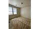 Cozy bedroom featuring neutral walls, carpet, and two windows allowing lots of natural light at 5445 Indian Cedar Dr, Las Vegas, NV 89135