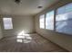 Bright bedroom with carpeted floors and natural light from multiple windows at 5445 Indian Cedar Dr, Las Vegas, NV 89135