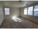 Spacious bonus room featuring lots of natural light and neutral carpet throughout at 5445 Indian Cedar Dr, Las Vegas, NV 89135