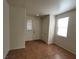 Home entryway with tile flooring, a window, and a white front door, creating a bright entrance at 5445 Indian Cedar Dr, Las Vegas, NV 89135