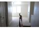 Upstairs hallway view features carpeting and leads to a room with two windows at 5445 Indian Cedar Dr, Las Vegas, NV 89135