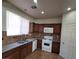 Bright kitchen includes modern appliances and granite countertops at 5445 Indian Cedar Dr, Las Vegas, NV 89135