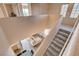 Bright foyer showcasing stairs, high ceilings, and an open view to the downstairs living area at 5524 Overlook Valley St, North Las Vegas, NV 89081