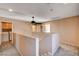 Upstairs hallway with laundry area and access to other rooms at 5524 Overlook Valley St, North Las Vegas, NV 89081