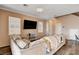 Living room features a large sectional sofa and television at 5524 Overlook Valley St, North Las Vegas, NV 89081