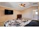 Large primary bedroom featuring a ceiling fan, and plenty of space for furniture at 5524 Overlook Valley St, North Las Vegas, NV 89081
